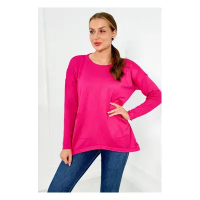 Sweater with fuchsia-colored front pockets