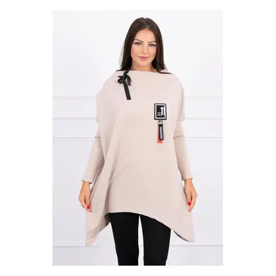 Oversized sweatshirt with asymmetrical sides in beige color