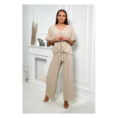 Set of blouse with trousers in beige color