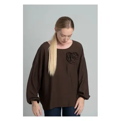 Oversized chocolate blouse with a decorative flower