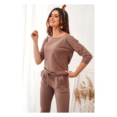 Women's jumpsuit fastened at the back with a cappuccino zip