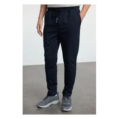 Trendyol Light Navy Blue Jogger Fit Tied Waist Textured Fabric Trousers