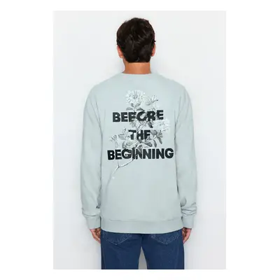 Trendyol Ice Blue Regular Cut Floral and Text Printed Inside Polar Fleece Sweatshirt