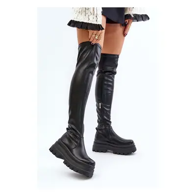 Over-the-knee boots on a massive platform black zinera