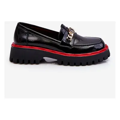 Patent leather loafers on the Black Ronin platform