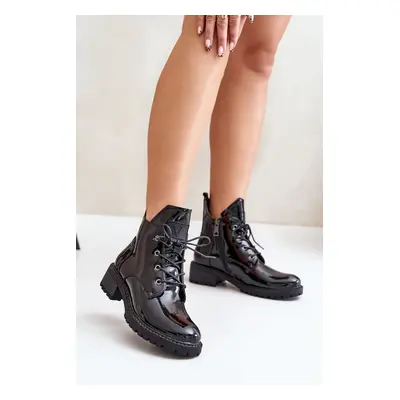 Insulated women's ankle boots on a low heel lacquered Vinceza black