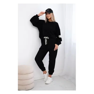 Cotton sweatshirt with a longer back + black trousers