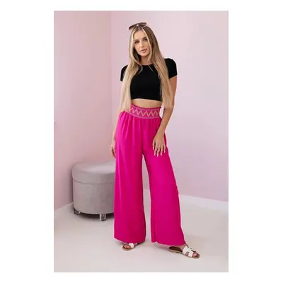 Trousers with a wide elastic waistband in fuchsia