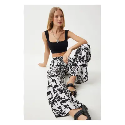 Happiness İstanbul Women's White Vibrant Black Patterned Loose Viscose Palazzo Trousers