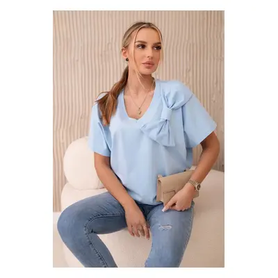 Cotton blouse with a decorative bow in blue color