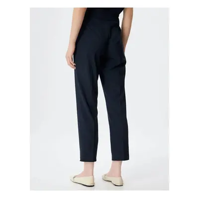 Koton Carrot Cut Fabric Trousers with Pleat Detail and Pockets, Standard Waist