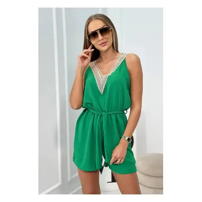 Short jumpsuit with decorative lace green