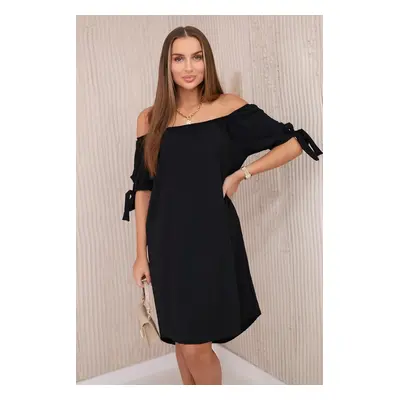 Kesi Dress with a longer back and a tie on the sleeves black