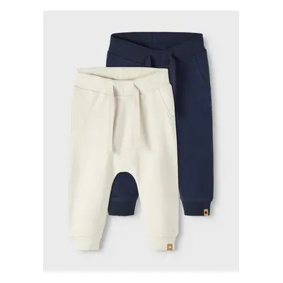 Set of two boys' sweatpants in cream and blue color name it Takki - Boys