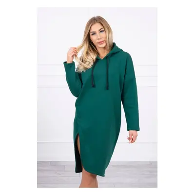 Dress with a hood and a slit on the side green