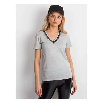 V-neck blouse decorated with gray lace