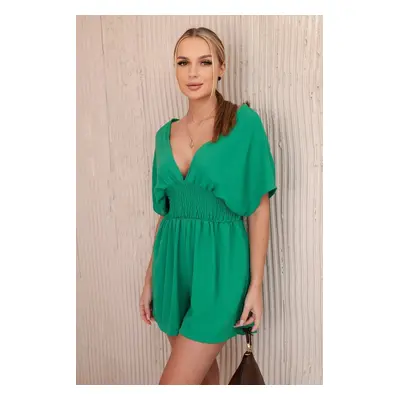 Green jumpsuit with ruffle waistband