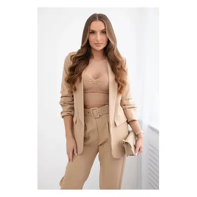 Elegant set of jacket and trousers light camel