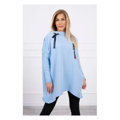 Oversized sweatshirt with asymmetrical sides in cyan color