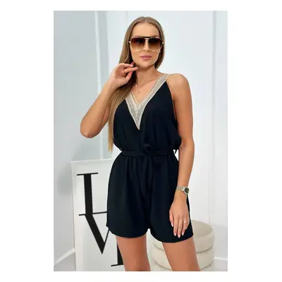 Short jumpsuit with decorative lace in black color