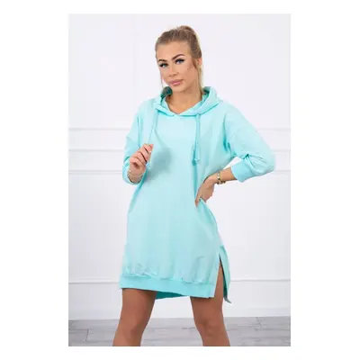 Dress with a hood and a longer back mint