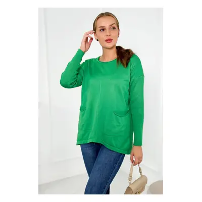 Sweater with front pockets in light green color