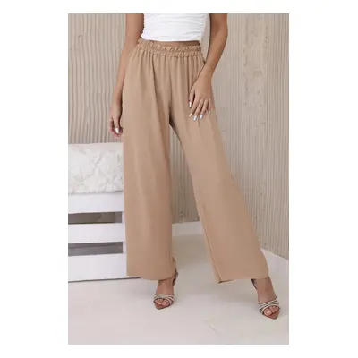 Brown trousers with wide legs