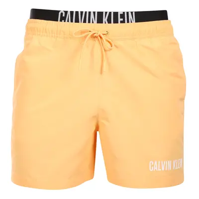 Férfi fürdőruha Calvin Klein narancs (KM0KM00992-SAN)