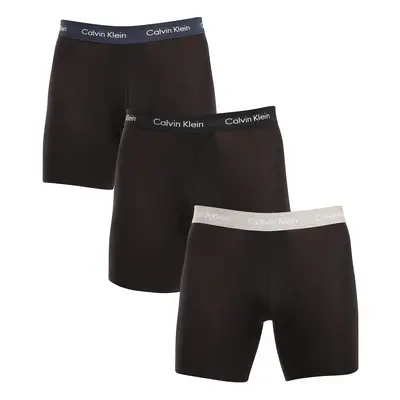 3PACK fekete Calvin Klein férfi boxeralsó (NB1770A-QRI)