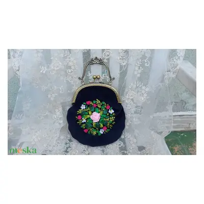 Velvet bag with embroidery.