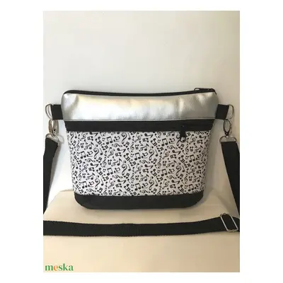 Crossbody zenekedvelőknek